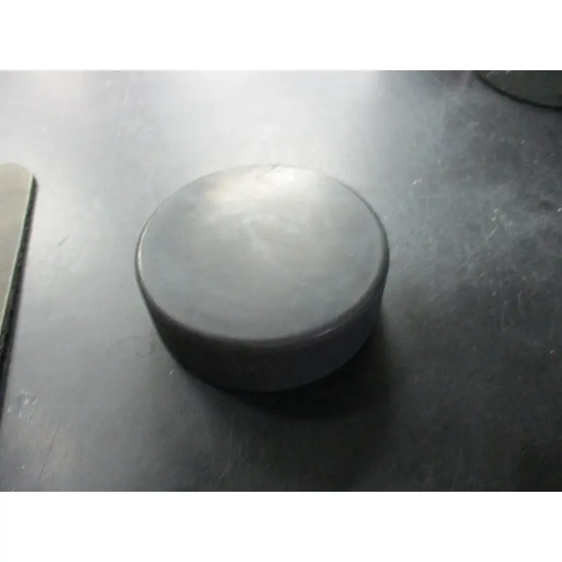 Used Black Rubber Hockey Puck