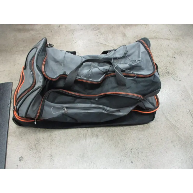 Used Coleman Wheeled Duffle Bag - Holes